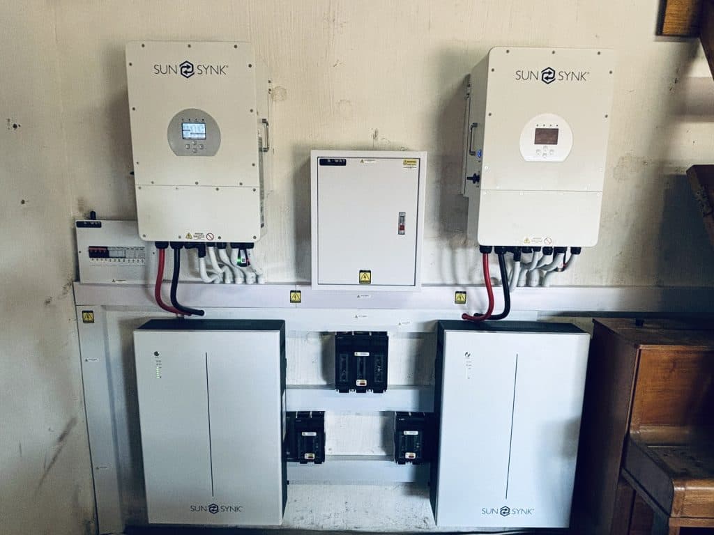 Installed solar inverters and battery storage.